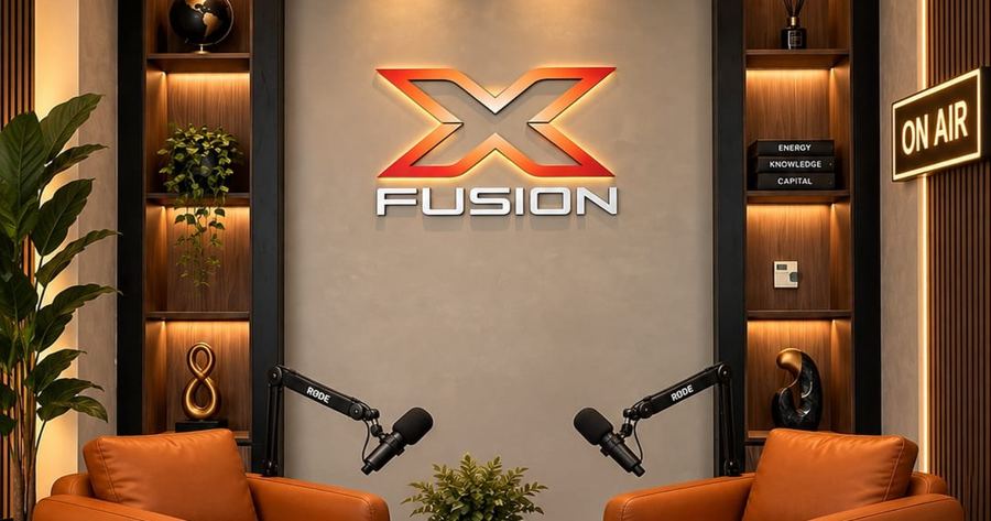 XFusion studio in Dubai with the XFusion logo wall, two armchairs and microphones