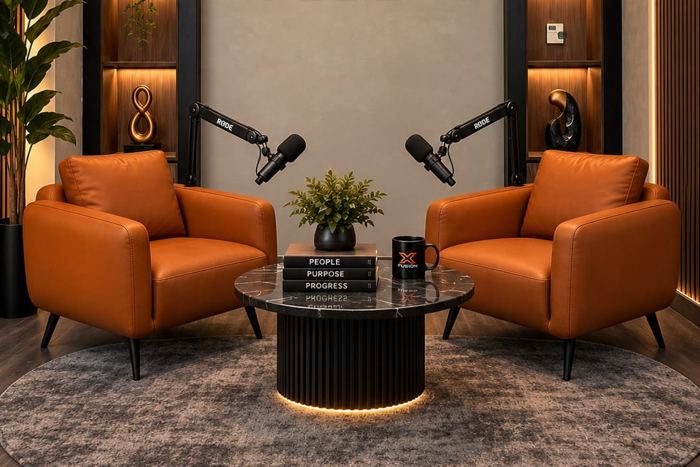 Two armchairs and a coffee table in the XFusion studio in Dubai